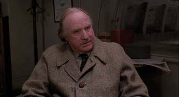 Movie still from “The Verdict” (1982), directed by Sidney Lumet – An older man wearing a jacket and tie; Close Up shot, Over the shoulder angle