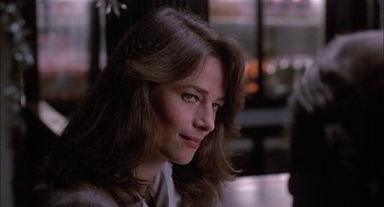 Movie still from “The Verdict” (1982), directed by Sidney Lumet – A person sitting at a table; Close Up shot, Over the shoulder angle