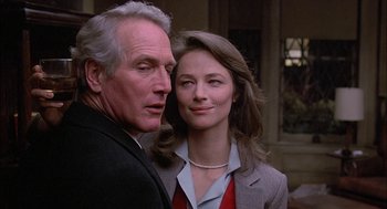 Movie still from “The Verdict” (1982), directed by Sidney Lumet – A man and a woman standing next to each other; Close Up shot, Low angle