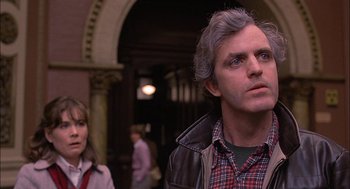 Movie still from “The Verdict” (1982), directed by Sidney Lumet – A man and a woman standing next to each other in front of an archway; Close Up shot, Low angle