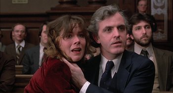 Movie still from “The Verdict” (1982), directed by Sidney Lumet – A man and a woman sitting next to each other in a room; Close Up shot, Low angle
