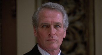 Movie still from “The Verdict” (1982), directed by Sidney Lumet – A person wearing a suit and tie; Close Up shot, Low angle