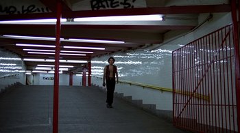 Movie still from “The Warriors” (1979), directed by Walter Hill – A man riding a skateboard down a ramp; Wide shot, Low angle