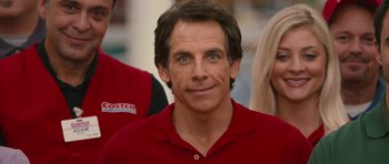 Movie still from “The Watch” (2012), directed by Akiva Schaffer – Ben stiller in a red shirt in front of two other people; Close Up shot, Over the shoulder angle