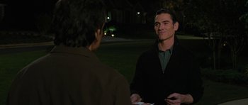 Movie still from “The Watch” (2012), directed by Akiva Schaffer – Two men are talking in a park at night; Medium shot, Over the shoulder angle