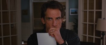 Movie still from “The Watch” (2012), directed by Akiva Schaffer – A person holding a piece of paper; Close Up shot, Over the shoulder angle