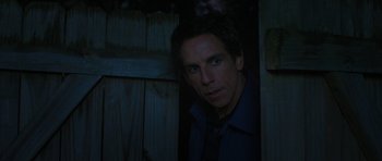 Movie still from “The Watch” (2012), directed by Akiva Schaffer – A person wearing a shirt and a tie; Medium shot, Over the shoulder angle