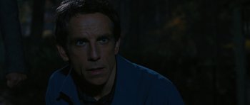 Movie still from “The Watch” (2012), directed by Akiva Schaffer – Ben stiller's face in the dark; Close Up shot, High angle