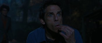 Movie still from “The Watch” (2012), directed by Akiva Schaffer – A person eating something; Close Up shot, High angle