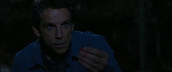Movie still from “The Watch” (2012), directed by Akiva Schaffer – A person holding a knife in his hand; Close Up shot, High angle