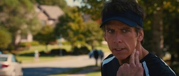 Movie still from “The Watch” (2012), directed by Akiva Schaffer – A person wearing a hat; Close Up shot, Over the shoulder angle