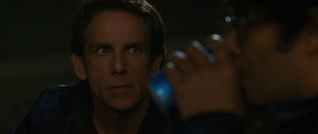 Movie still from “The Watch” (2012), directed by Akiva Schaffer – Ben stiller looking at a cell phone in front of him; Close Up shot, Over the shoulder angle
