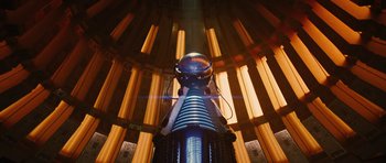 Movie still from “The Watch” (2012), directed by Akiva Schaffer – A light that is sitting in the middle of a building; Extreme Wide shot, Low angle