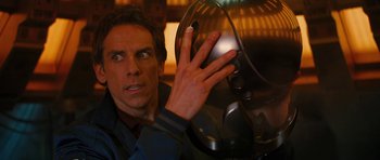 Movie still from “The Watch” (2012), directed by Akiva Schaffer – A person with a hand on a fan; Close Up shot, Overhead angle