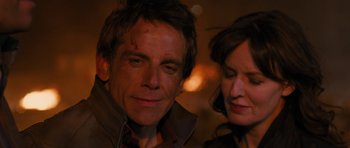 Movie still from “The Watch” (2012), directed by Akiva Schaffer – A person and a woman; Close Up shot, High angle