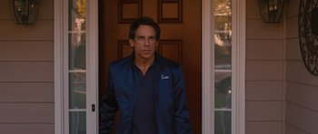 Movie still from “The Watch” (2012), directed by Akiva Schaffer – Ben stiller standing in front of a door; Medium shot, Over the shoulder angle