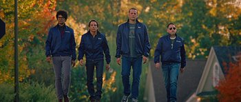 Movie still from “The Watch” (2012), directed by Akiva Schaffer – A group of men walking down a sidewalk; Wide shot, Low angle