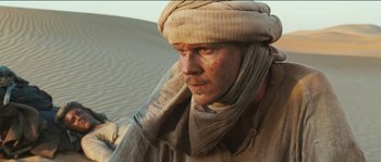 Movie still from “The Way Back” (2010), directed by Peter Weir – A person wearing a turban; Close Up shot, Low angle
