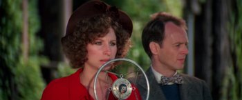 Movie still from “The Way We Were” (1973), directed by Sydney Pollack – A woman in a brown hat and a man in a brown suit; Close Up shot, Over the shoulder angle