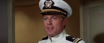 Movie still from “The Way We Were” (1973), directed by Sydney Pollack – A person wearing a uniform; Close Up shot, Low angle