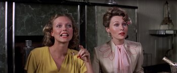 Movie still from “The Way We Were” (1973), directed by Sydney Pollack – Two women are sitting next to each other; Close Up shot, Low angle