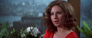 Movie still from “The Way We Were” (1973), directed by Sydney Pollack – A person wearing a red shirt; Close Up shot, Over the shoulder angle