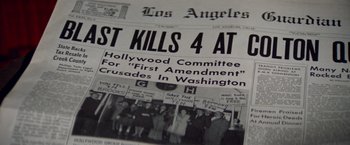 Movie still from “The Way We Were” (1973), directed by Sydney Pollack – A black and white photo of a newspaper; Extreme Close Up shot, High angle