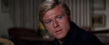 Movie still from “The Way We Were” (1973), directed by Sydney Pollack – A person with blond hair and blue eyes; Close Up shot, Low angle