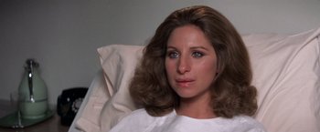 Movie still from “The Way We Were” (1973), directed by Sydney Pollack – A person sitting in a hospital bed; Close Up shot, High angle