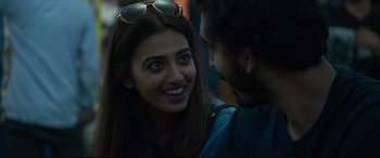 Movie still from “The Wedding Guest” (2018), directed by Michael Winterbottom – A man and a woman are talking to each other; Close Up shot, Over the shoulder angle