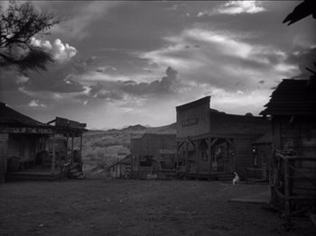 Movie still from “The Westerner” (1940), directed by William Wyler – An old western town in the middle of a desert; Extreme Wide shot, Low angle