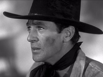Movie still from “The Westerner” (1940), directed by William Wyler – A black and white photo of a man wearing a cowboy hat; Close Up shot, Low angle