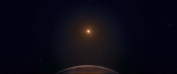 Movie still from “The Wild Pear Tree” (2018), directed by Nuri Bilge Ceylan – A view of the earth from space at night with the sun in the background; Extreme Wide shot, Overhead angle