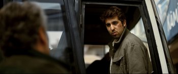 Movie still from “The Wild Pear Tree” (2018), directed by Nuri Bilge Ceylan – A person in a car window; Close Up shot, Over the shoulder angle