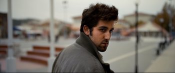 Movie still from “The Wild Pear Tree” (2018), directed by Nuri Bilge Ceylan – A person wearing a jacket; Close Up shot, Low angle