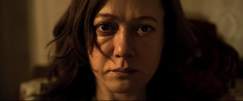 Movie still from “The Wild Pear Tree” (2018), directed by Nuri Bilge Ceylan – A woman's face in the dark; Close Up shot, Low angle