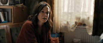 Movie still from “The Wild Pear Tree” (2018), directed by Nuri Bilge Ceylan – A person sitting in a room near a window; Close Up shot, Over the shoulder angle