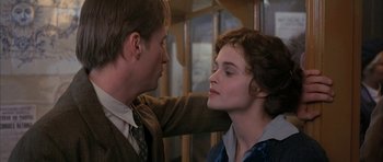 Movie still from “The Wings of the Dove” (1997), directed by Iain Softley – A man and a woman touching each other's face; Close Up shot, Over the shoulder angle