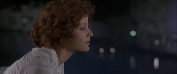 Movie still from “The Wings of the Dove” (1997), directed by Iain Softley – A person with curly red hair; Close Up shot, Low angle
