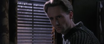 Movie still from “The Wings of the Dove” (1997), directed by Iain Softley – A person wearing a sweater; Close Up shot, Low angle