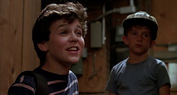 Movie still from “The Wizard” (1989), directed by Todd Holland – Two young boys standing next to each other in a room; Close Up shot, Low angle