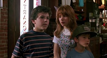 Movie still from “The Wizard” (1989), directed by Todd Holland – A group of people standing next to each other; Medium shot, Low angle