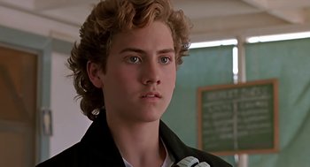 Movie still from “The Wizard” (1989), directed by Todd Holland – A person wearing a jacket; Close Up shot, Low angle