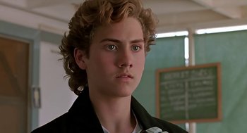 Movie still from “The Wizard” (1989), directed by Todd Holland – A person wearing a jacket; Close Up shot, Low angle