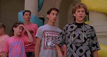 Movie still from “The Wizard” (1989), directed by Todd Holland – A group of young men standing next to each other; Medium shot, Low angle