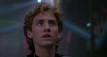 Movie still from “The Wizard” (1989), directed by Todd Holland – A person looking up at the sky; Close Up shot, Low angle