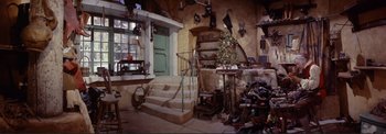 Movie still from “The Wonderful World of the Brothers Grimm” (1962), directed by Henry Levin – A room filled with lots of shoes on the stairs; Wide shot, High angle