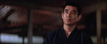 Movie still from “The Yakuza” (1974), directed by Sydney Pollack – A person wearing a robe; Close Up shot, Low angle