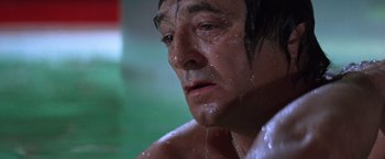 Movie still from “The Yakuza” (1974), directed by Sydney Pollack – A person with water on his face; Close Up shot, Low angle