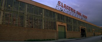 Movie still from “The Yards” (2000), directed by James Gray – An industrial building that has been converted into an electrical station; Extreme Wide shot, Low angle